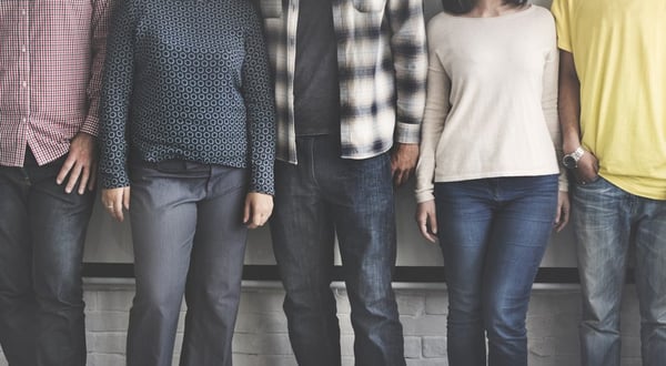Team of people standing together in friendship