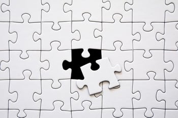 Image of a puzzle with piece missing representing the productivity puzzle challenge